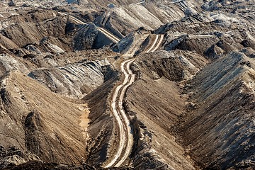 Image showing Large excavation site with roads ahead