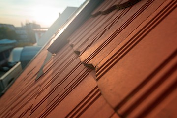 Image showing Roof tile over blue sky