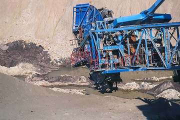 Image showing Large excavator machine in the mine