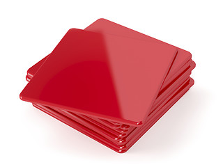 Image showing Red plastic beermats