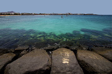 Image showing windsurf pier boat in the blue sky   arrecife teguise