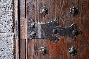 Image showing castle lock spain knocker  abstract r wood in the red brown 