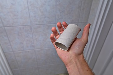 Image showing Finding empty roll in the restroom