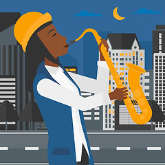 Image showing Woman playing saxophone.