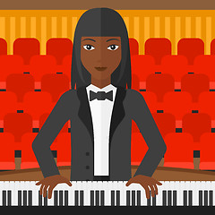 Image showing Woman playing piano.