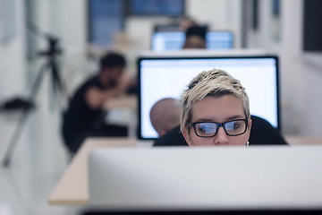 Image showing startup business, woman  working on desktop computer