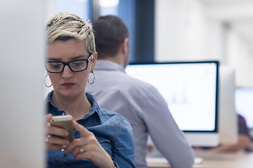 Image showing startup business, woman  working on desktop computer