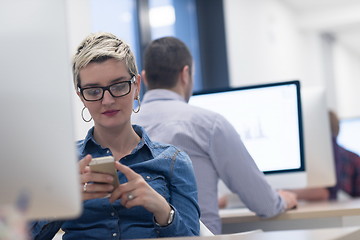 Image showing startup business, woman  working on desktop computer