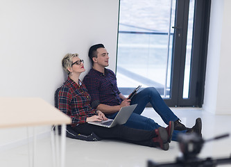 Image showing startup business, couple working on laptop computer at office