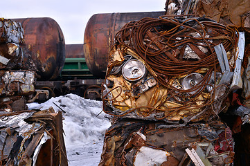 Image showing A pile of compressed cars in blocks for processing