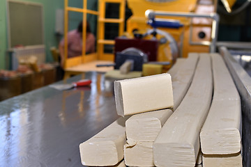 Image showing Pieces of soap on a conveyor belt