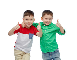 Image showing happy smiling little boys showing thumbs up