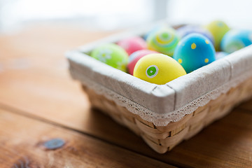 Image showing close up of colored easter eggs in basket