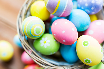 Image showing close up of colored easter eggs in basket