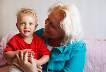 Image showing Happy grandmother with her little grandson.