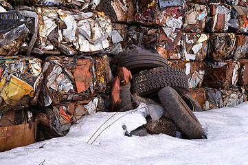 Image showing A pile of compressed cars in blocks for processing