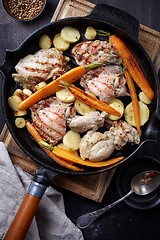 Image showing chicken meat and roasted vegetables on cooking pan