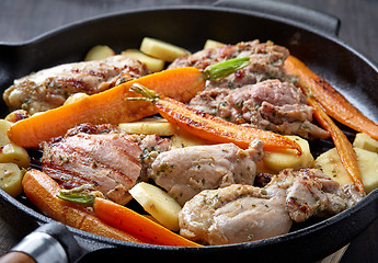 Image showing chicken meat and roasted vegetables on cooking pan