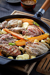 Image showing chicken meat and roasted vegetables on cooking pan