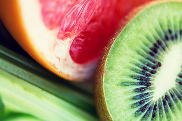 Image showing close up of ripe kiwi and grapefruit slices