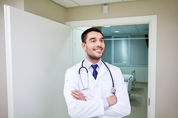 Image showing smiling doctor with stethoscope at hospital 