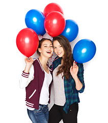 Image showing happy teenage girls with helium balloons