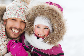 Image showing happy family in winter clothes outdoors