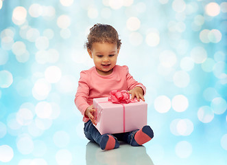 Image showing happy little baby girl with birthday present