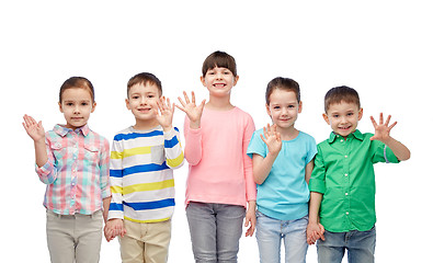 Image showing happy smiling little children holding hands