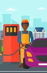 Image showing Man filling up fuel into car.