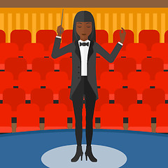 Image showing Conductor directing with baton.