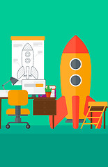 Image showing Background of workspace with business start-up rocket.