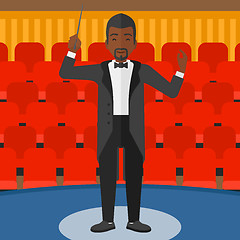 Image showing Conductor directing with baton.