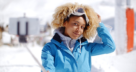 Image showing Attractive young woman with a modern afro hairdo