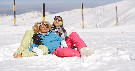 Image showing Affectionate young couple enjoying the fresh snow