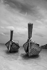 Image showing Longtailboats tied together