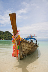 Image showing Longtailboat at the beach