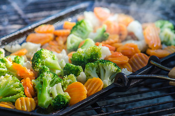 Image showing Vegetables fried on coals, close up. Note: Shallow depth of fiel