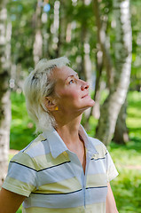 Image showing Portrait of the woman in a birch wood