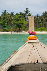 Image showing Longtailboat fronting the beach