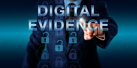 Image showing Cyber Investigator Touching DIGITAL EVIDENCE\r