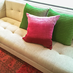 Image showing Modern sofa with bright cushions