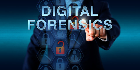 Image showing Investigator Pushing DIGITAL FORENSICS\r