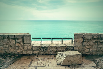 Image showing View over turquoise sea and clouds