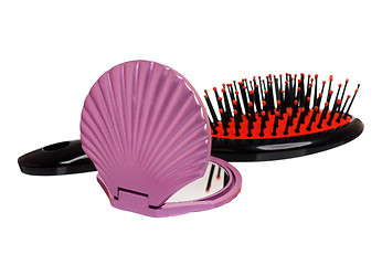 Image showing Mirror and small hairbrush