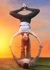 Image showing The two people doing yoga exercises 