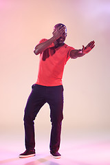 Image showing The young cool black man is dancing