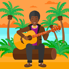 Image showing Man playing guitar.