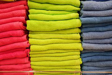 Image showing Stacks of multicolored towels  