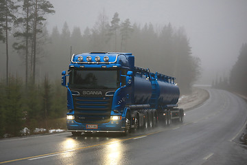 Image showing Blue Scania R580 Tank Truck Pushes Forward in Fog